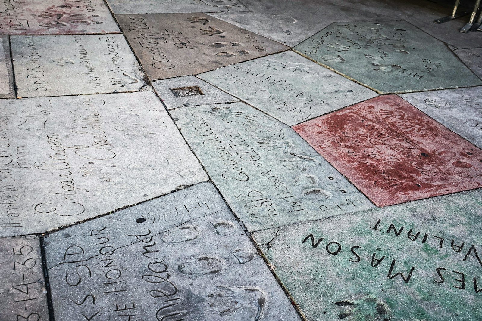 Handprints and footprints embedded in concrete